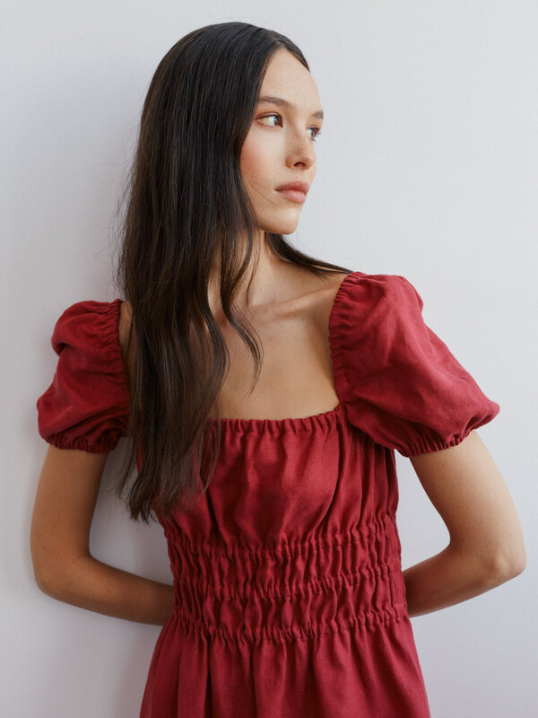 Image 1 of HOLIDAY Puff Sleeve Linen Midi Dress in Raspberry from Love and Confuse