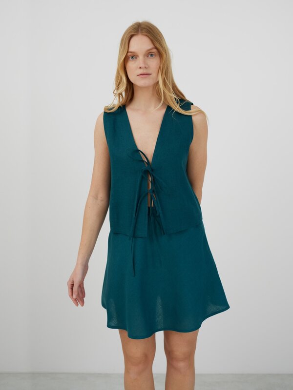 Image 1 of COLE Tie Front Linen Vest in Emerald Blue from Love and Confuse