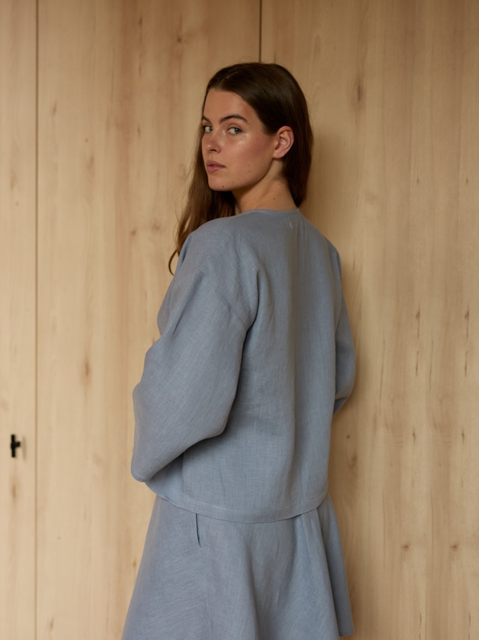 Image 3 of SOFIA linen kimono wrap top in Vista Blue, featuring a side tie closure and wide 3/4 sleeves, from Love and Confuse.