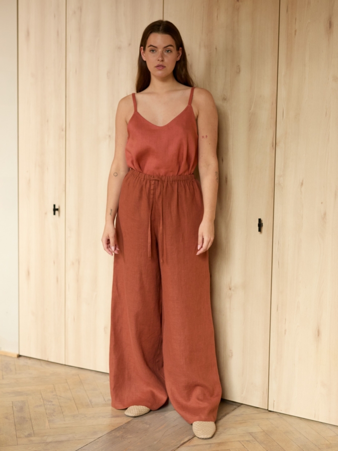 Image 2 of LUCAS wide-leg linen pants in Rust, featuring a drawstring waist and relaxed fit, from Love and Confuse.