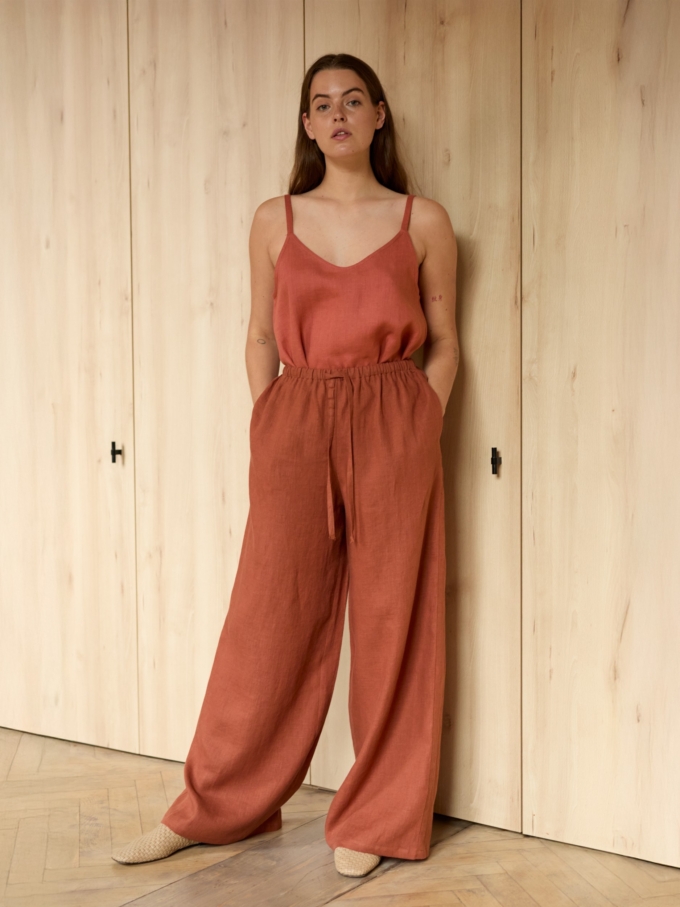 Image 4 of LUCAS wide-leg linen pants in Rust, featuring a drawstring waist and relaxed fit, from Love and Confuse.