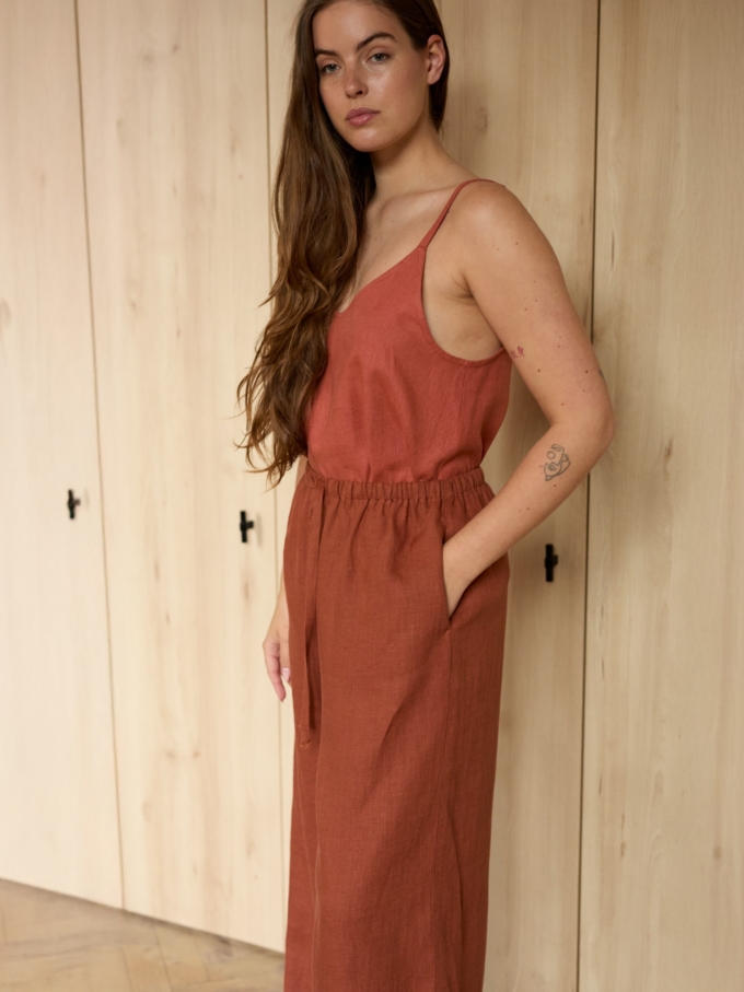 Image 5 of LUCAS wide-leg linen pants in Rust, featuring a drawstring waist and relaxed fit, from Love and Confuse.