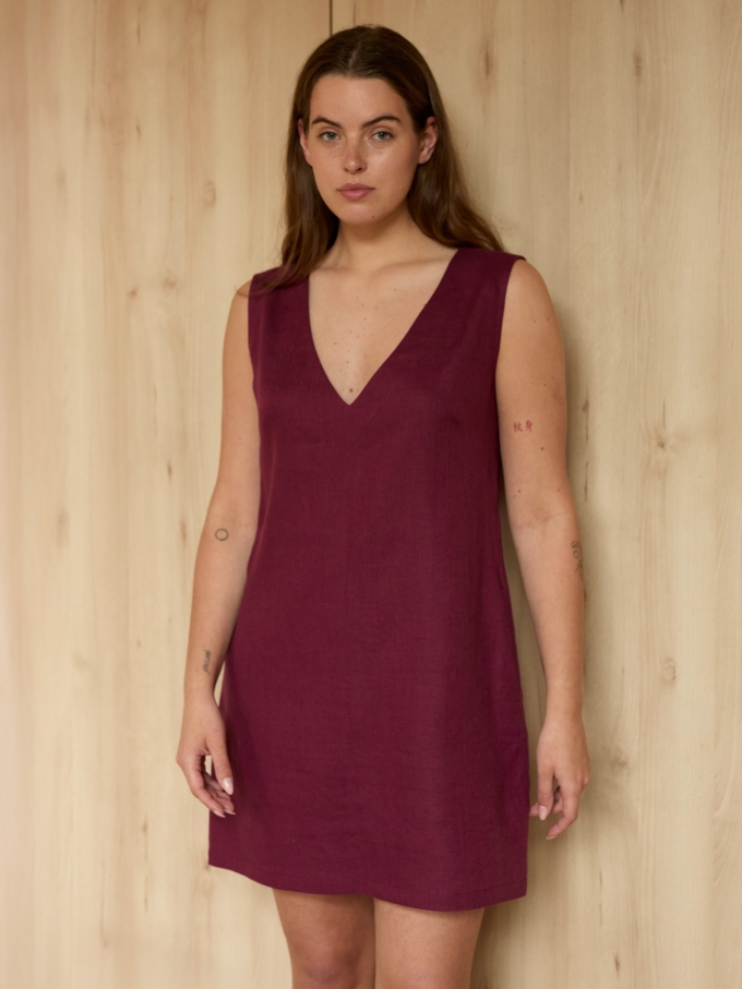 Image 1 of PAULA sleeveless linen shift dress in Eggplant, featuring a V-neck and side pockets, from Love and Confuse.