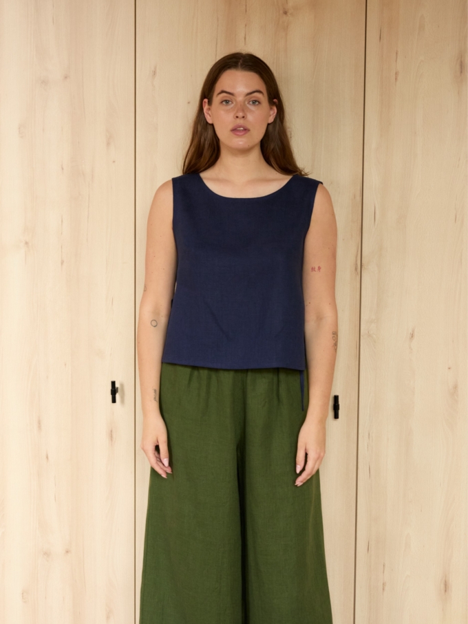 Image 2 of AVERY linen tank top in Navy Blue, featuring adjustable side ties and a scoop neckline, from Love and Confuse.