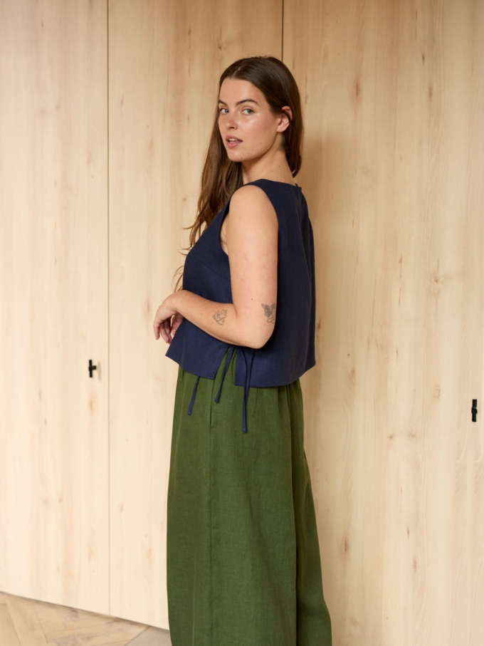 Image 3 of AVERY linen tank top in Navy Blue, featuring adjustable side ties and a scoop neckline, from Love and Confuse.