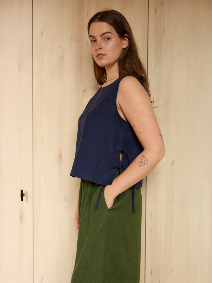 Image 4 of AVERY linen tank top in Navy Blue, featuring adjustable side ties and a scoop neckline, from Love and Confuse.