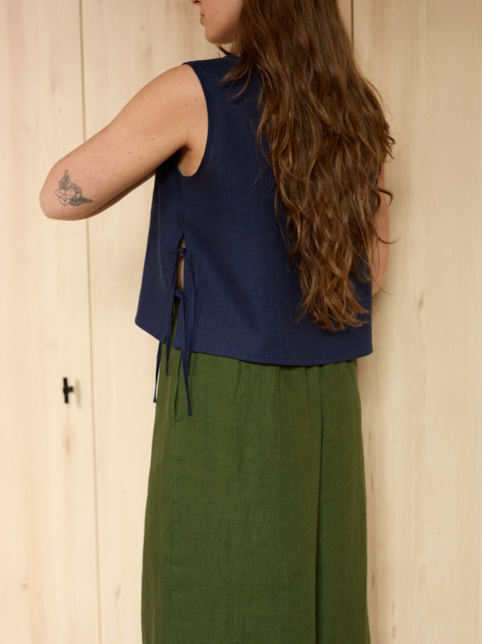 Image 6 of AVERY linen tank top in Navy Blue, featuring adjustable side ties and a scoop neckline, from Love and Confuse.