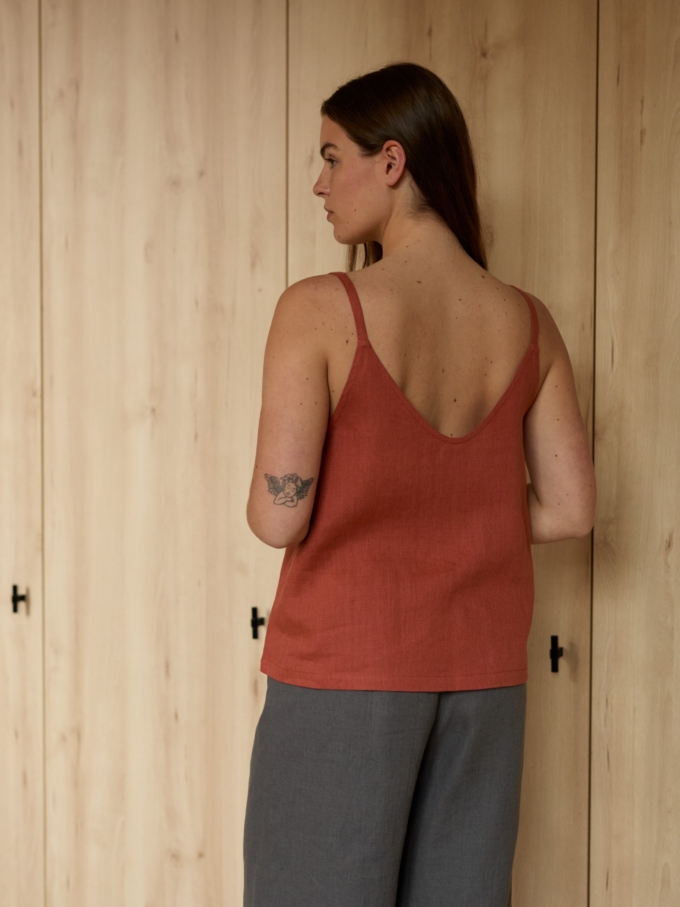 Image 3 of MILLIE linen tank top in Burnt Orange, featuring a V-neck and thin straps, from Love and Confuse.