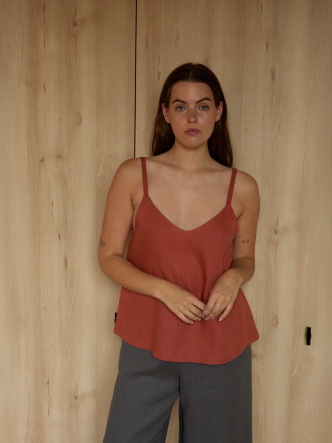 Image 4 of MILLIE linen tank top in Burnt Orange, featuring a V-neck and thin straps, from Love and Confuse.