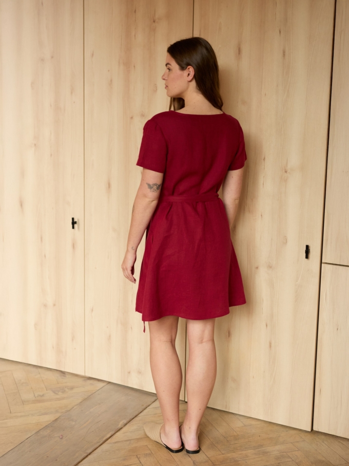 Image 4 of SADIE short sleeve linen wrap dress in Cherry Red, featuring a flattering V-neck and A-line mini skirt, from Love and Confuse.